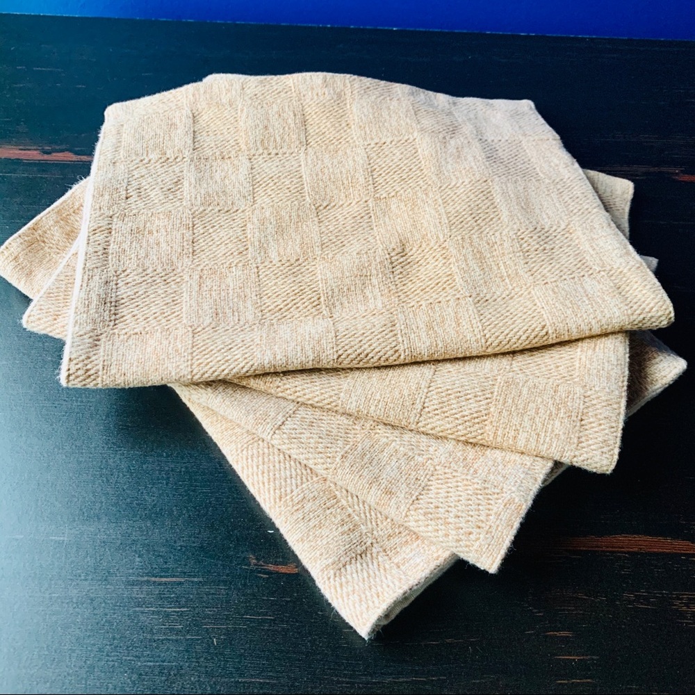 Four cloth placemats, tan